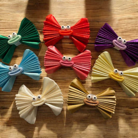 Character themed faces hair bow clip